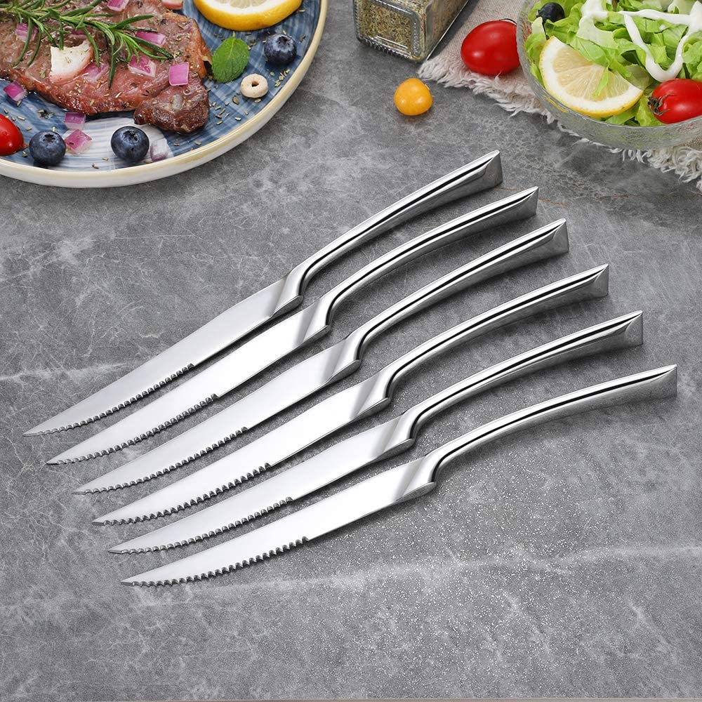 Steak knives standing upright
