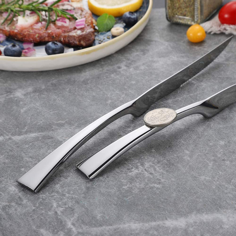 Steak knives on a dinner table