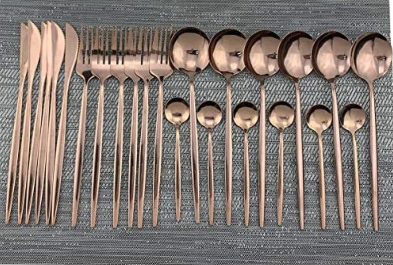 Full 24-piece silverware set laid out